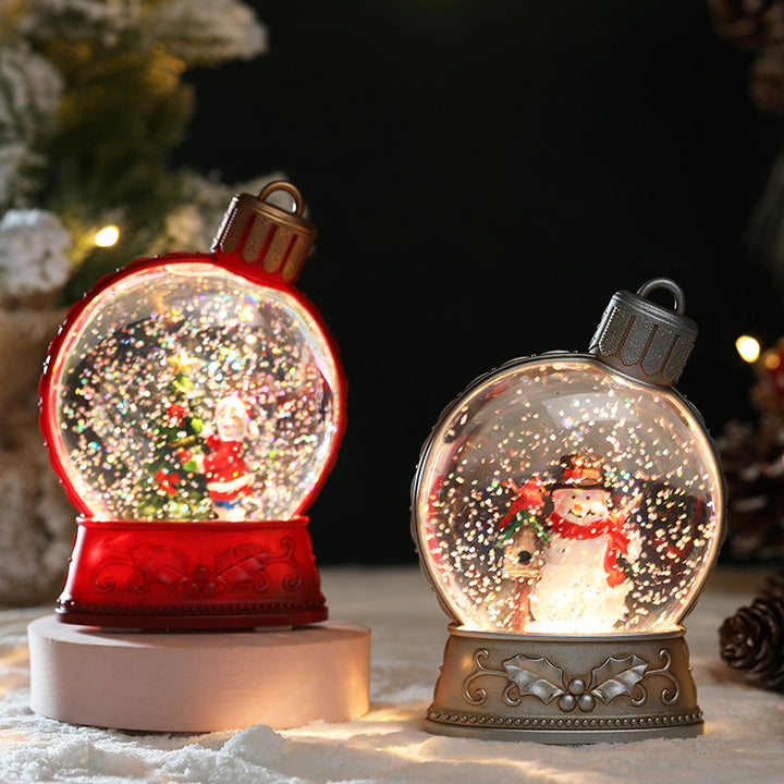 Upplyst glitterkula med snögubbe