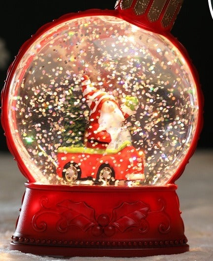Upplyst glitterkula med snögubbe