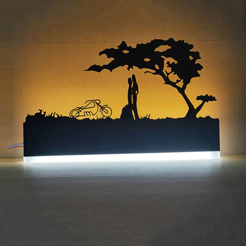 Vägglampa med mångsidig design