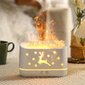 Vit doftspridare med ren och flamljus