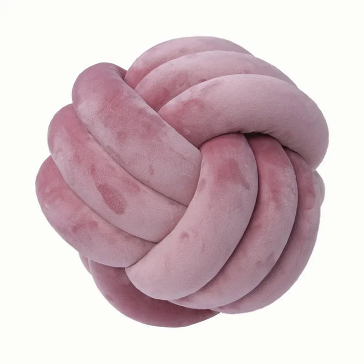 Dekorativ, mjuk kudde med knuten boll i mocka-look